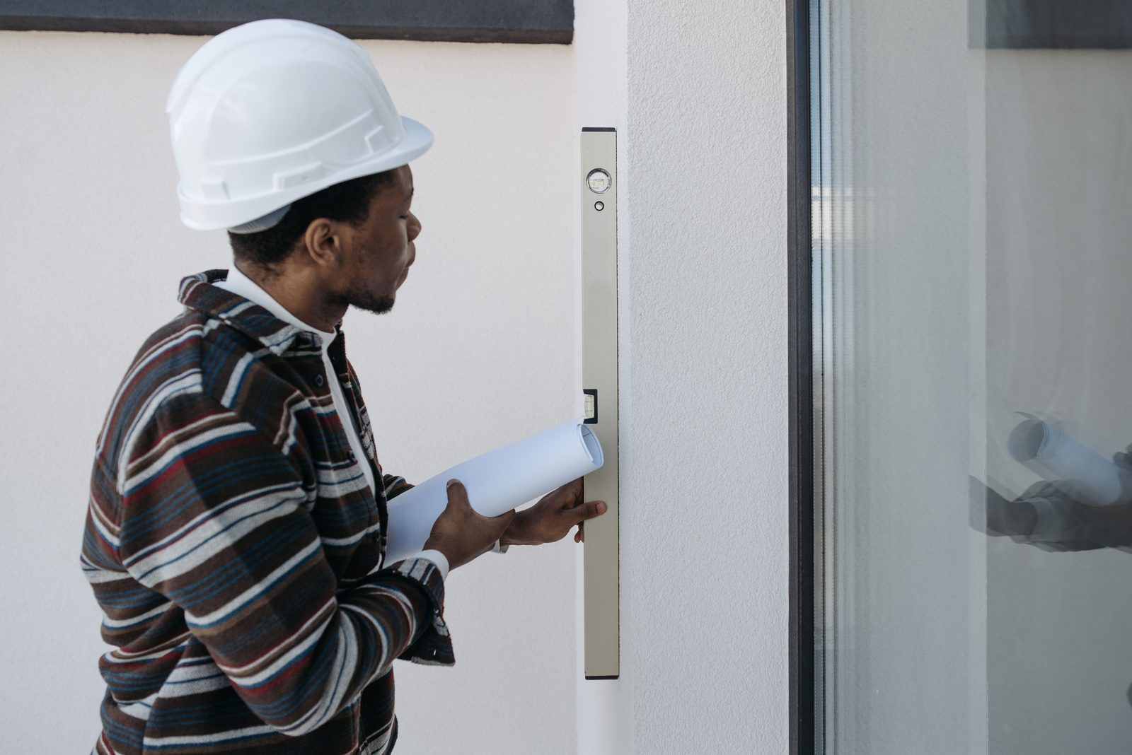 A specialist assessing a building during a property inspection