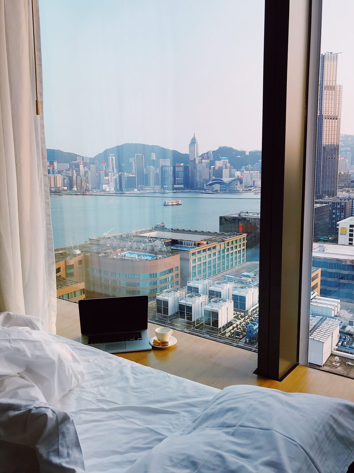Hospitality property with a waterfront city view